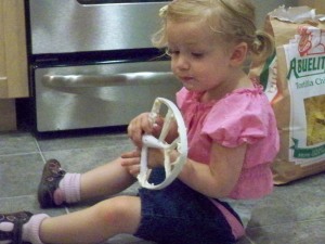 Karol had the honor of licking the beater!  Well, Mommy helped...